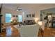 Bright living room with hardwood floors, stylish decor, and large windows for natural light at 340 Andrews Store Rd, Pittsboro, NC 27312