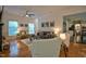 Bright living room boasts hardwood floors, recessed lighting, and neutral decor at 340 Andrews Store Rd, Pittsboro, NC 27312