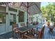 Back patio featuring a wooden table and chairs and a umbrella at 340 Andrews Store Rd, Pittsboro, NC 27312