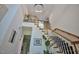 Elegant staircase featuring wood and white accents and view into a side room at 340 Andrews Store Rd, Pittsboro, NC 27312