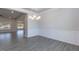 Elegant dining room featuring chair rail molding, chandelier, and lots of natural light at 534 Glenkirk Pl # 110, Garner, NC 27529
