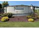 Annandale community stone entrance with landscaping and signage at 534 Glenkirk Pl # 110, Garner, NC 27529