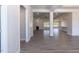 Spacious living room with hardwood floors and plenty of natural light at 534 Glenkirk Pl # 110, Garner, NC 27529