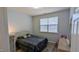 Cozy bedroom features a comfortable bed, natural light, and inviting decor at 101 Clardona Way, Holly Springs, NC 27540