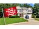 Charming two-story home with a manicured lawn and a promotion of up to $14,500 in closing costs at 101 Clardona Way, Holly Springs, NC 27540