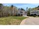 Traditional two-story home with an attached two-car garage and a spacious front yard at 101 Clardona Way, Holly Springs, NC 27540