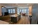 Modern kitchen with stainless steel appliances and open concept layout at 101 Clardona Way, Holly Springs, NC 27540