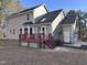 Two-story house with attached garage and red deck at 106 Bradley Dr, Benson, NC 27504