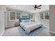 Serene bedroom with window and blue bedding at 1201 Enderbury Dr, Raleigh, NC 27614