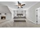 Spacious bedroom with fireplace and ample natural light at 1201 Enderbury Dr, Raleigh, NC 27614