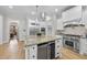 Modern kitchen with stainless steel appliances and granite countertops at 1201 Enderbury Dr, Raleigh, NC 27614