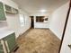 Bright dining area adjacent to the kitchen, featuring an opening to the living room, creating an open concept feel at 204 Hemlock Dr, Durham, NC 27705