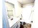 Bathroom features a vanity with modern fixtures and a shower-tub combination at 211 Drayton Hall Ln, Sanford, NC 27330