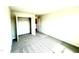 Carpeted bedroom with a standard closet and neutral colored walls at 211 Drayton Hall Ln, Sanford, NC 27330