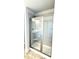 Modern bathroom featuring a glass enclosed shower with chrome hardware and subway tile surround at 211 Drayton Hall Ln, Sanford, NC 27330