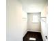Empty walk-in closet with carpet, a window and wire shelving in a new home at 211 Drayton Hall Ln, Sanford, NC 27330