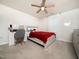 Charming bedroom with a red bedspread and a vanity at 490 Mallard Loop Dr, Clayton, NC 27527