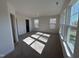 Bright bedroom with carpet flooring and multiple windows at 6334 Lady Eliza Ln, Raleigh, NC 27610