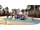Community playground with climbing structures, pirate ship theme, slide, and soft landing surface at 69 Streamline Ct, Lillington, NC 27546