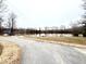 Scenic paved walking path near the water offers a relaxing outdoor experience at 69 Streamline Ct, Lillington, NC 27546