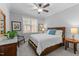 Bedroom with wooden bed frame and window at 8117 Bud Morris Rd, Wake Forest, NC 27587