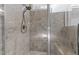 Large walk-in shower with tile surround and built-in seat at 8117 Bud Morris Rd, Wake Forest, NC 27587