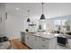 Open concept kitchen with granite island and stainless steel appliances at 1012 Westerland Way # 201, Durham, NC 27703