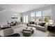 Bright and airy living room with ample seating and natural light at 1034 Westerland Way # 210, Durham, NC 27703