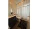 Bathroom boasts updated fixtures and natural light at 1118 Jackson St, Burlington, NC 27217