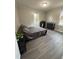 This staged bedroom features plank flooring, paint, and decor at 1118 Jackson St, Burlington, NC 27217