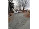 Charming, one-story home with rock-covered yard and covered front porch at 1118 Jackson St, Burlington, NC 27217