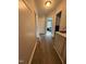 Hallway with updated floors and natural light at 1118 Jackson St, Burlington, NC 27217