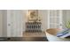 Light-filled foyer with console table, lamp, decorative accents, and double french doors at 113 Reagan Crest Dr, Clayton, NC 27520