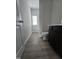 Well lit bathroom with wood look floors and single sink at 120 Vili Dr, Broadway, NC 27505