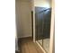 Bathroom showing shower with tiled walls, glass door and wood look floors at 120 Vili Dr, Broadway, NC 27505