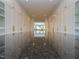 Extensive walk-in closet features dark granite countertops and custom storage solutions at 1425 Sky Vista Way, Raleigh, NC 27613