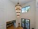 Stunning foyer with a soaring ceiling, grand chandelier, and views into the dining and entry at 1425 Sky Vista Way, Raleigh, NC 27613