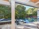 Secluded swimming pool view showcasing the crystal-clear water and modern lounge chairs, creating a relaxing oasis at 1425 Sky Vista Way, Raleigh, NC 27613