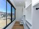 Well-organized walk-in closet with custom shelving, drawers, and natural light from a large window at 1425 Sky Vista Way, Raleigh, NC 27613