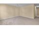 Spacious bedroom featuring neutral carpeting and a ceiling fan for added comfort at 1732 Great Bend Dr, Durham, NC 27704
