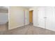 Bedroom featuring neutral carpeting, an ensuite bath, and plenty of closet space at 1732 Great Bend Dr, Durham, NC 27704