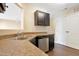 The kitchen features wooden floors and stainless steel appliances at 1732 Great Bend Dr, Durham, NC 27704