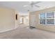 Inviting living room featuring neutral carpeting and plenty of natural light at 1732 Great Bend Dr, Durham, NC 27704