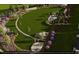 A peaceful green space provides walking paths, landscaping, and a playground for residents to enjoy at 2155 Pink Peony Cir # 235, Durham, NC 27703
