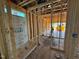Unfinished bathroom with wood framing and a pre-fabricated shower base at 2155 Pink Peony Cir # 235, Durham, NC 27703
