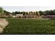 Playground featuring swings and mature landscaping at 2155 Pink Peony Cir # 235, Durham, NC 27703