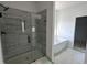 Bathroom with walk-in shower and soaking tub at 5168 Church Rd # 22, New Hill, NC 27562