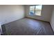 Clean bedroom with natural light; ready for your personal touches at 5168 Church Rd # 22, New Hill, NC 27562