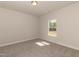 Bedroom featuring neutral walls, carpet flooring, recessed lighting, and a bright window at 587 Glenkirk Pl, Garner, NC 27529