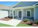 Charming single-story home showcasing neat landscaping and a welcoming entrance at 587 Glenkirk Pl, Garner, NC 27529